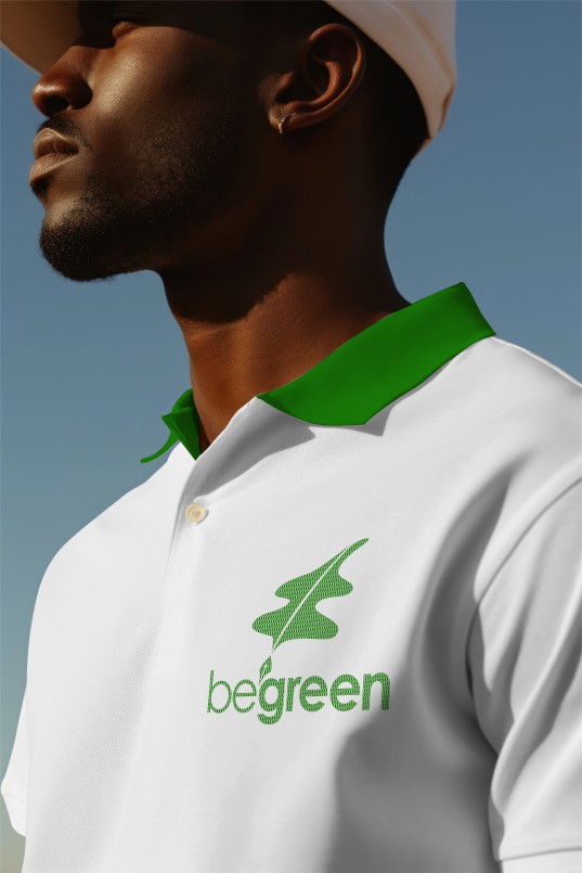 Be Green logo design embroidered on white polo shirt