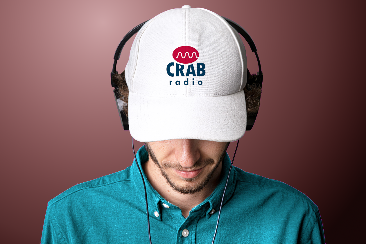 CRAB Radio logo design embroidered on white baseball cap