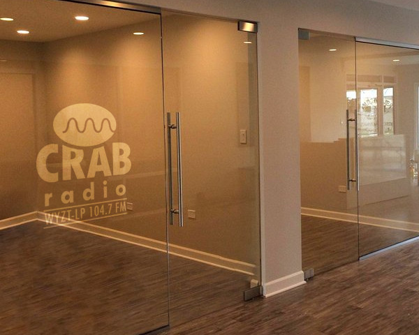 CRAB Radio logo design on glass office door